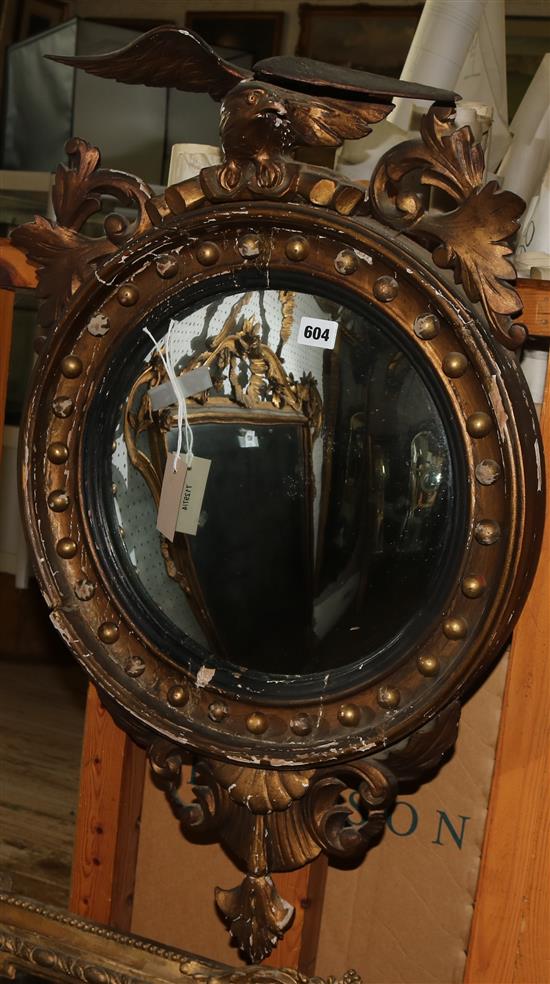 Regency still giltwood convex mirror